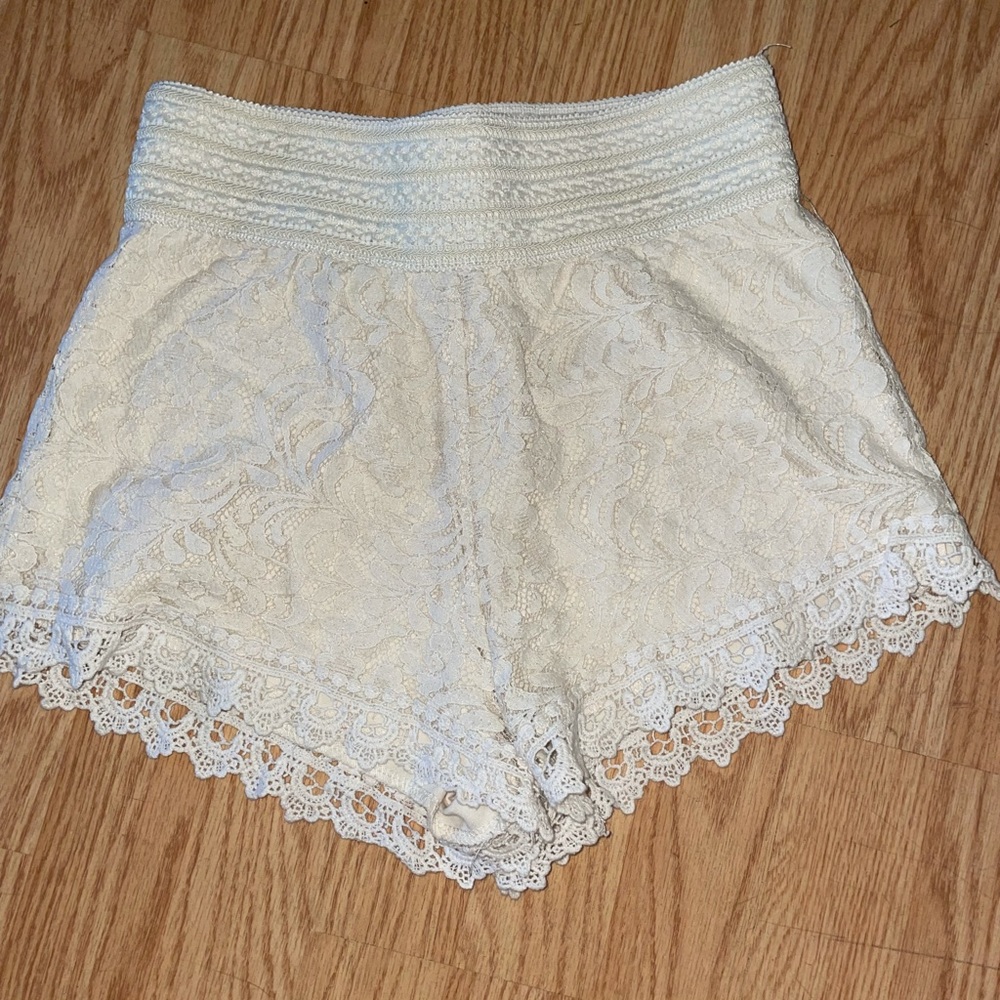 high-waisted white lace shorts
